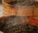 Traditional roasting process of Dahongpao oolong tea, where careful heat brings balance rather than smoky intensity