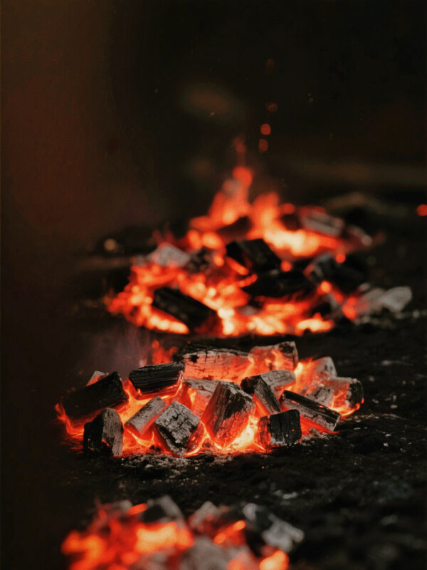 Charcoal fire used in traditional Dahongpao roasting, influencing warmth, depth, and smoky notes in the tea