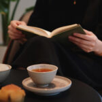 A quiet moment of drinking Chinese tea after a meal, creating a simple daily ritual of comfort and ease.