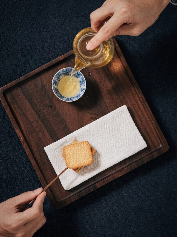 Chinese tea enjoyed after different meals, emphasizing balance, comfort, and a gentle sensory pairing.