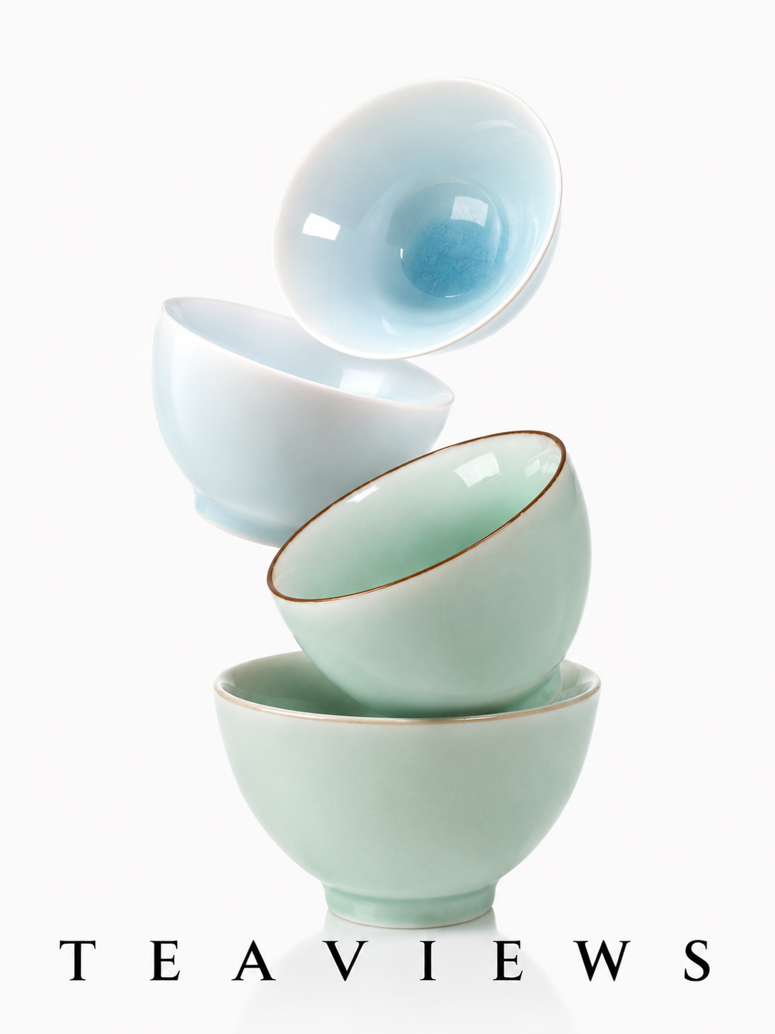 Stacked Longquan celadon tea cups in a minimalist still life, showing jade-like glaze, tactile beauty, and Teaviews teaware aesthetics.