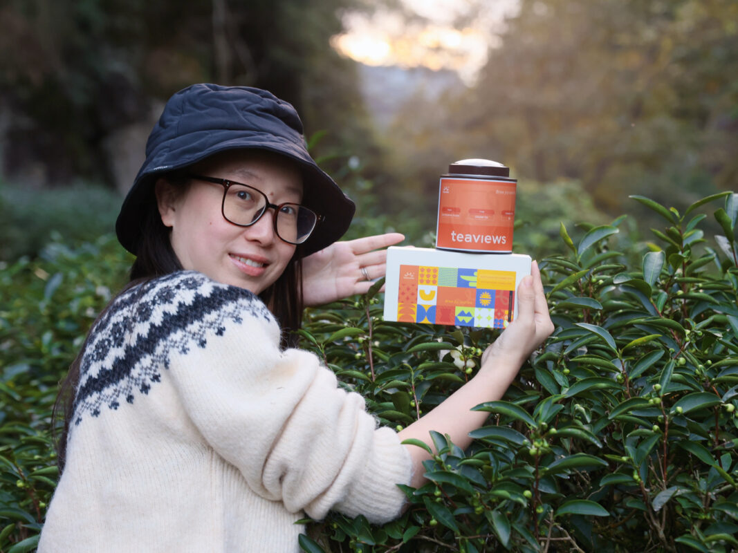 Teaviews founder holding a Chinese tea product, sharing the brand’s everyday approach to tea.
