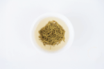 Infused leaves of Hengxian Jasmine Tea after brewing in a white bowl.