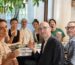 Ling Chen sharing Chinese tea with guests at a tea gathering in Milan.